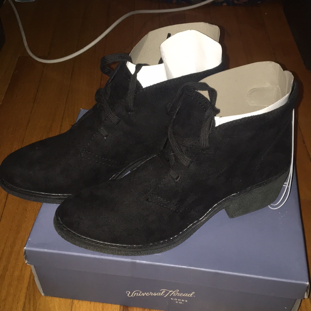 Heeled black booties